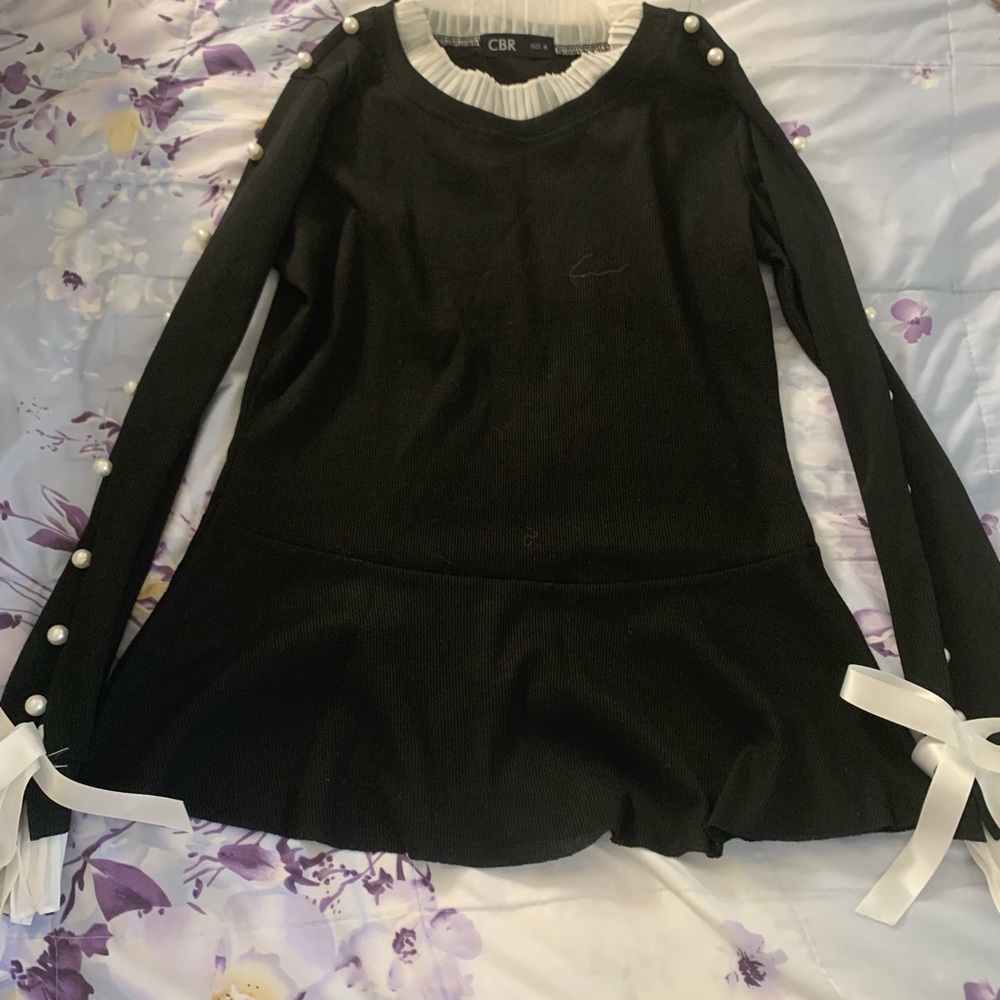 CBR black long sleeve with pearl and bow tie on sleeves